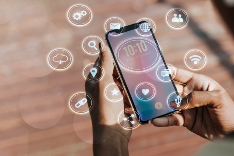 Cambodia Digital Service Growth: A person holds a smartphone displaying the time and date, surrounded by floating icons representing various apps and features.