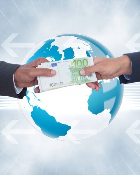 Cambodia Export Tariff Avoidance: Two businessmen hand over a €100 bill in front of a globe, symbolizing international financial transactions and global trade.